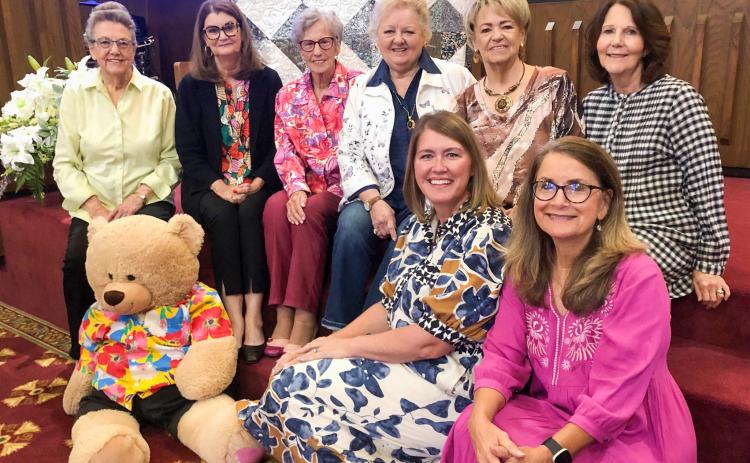 Bazaar Bear gathers with the Wellington Methodist Women for a preview of the 2025 quilt during a recent Sunday morning worship service. The quilt raffle will take place at 1 p.m. Saturday, Nov. 1 during the Methodist Women’s Fall Bazaar. Front row, from left: Kelly Bawcom, Karen Caldwell. Second row, from left: Sharon Starkey, Deltah Henard, Fran Eigenmann, Leslie Schnaufer, Charlotte Stephens, Nancy Henard. The Red River Sun/Bev Odom
