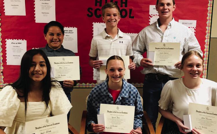 Daughters of the American Revolution present Wellington Junior High School Youth Citizenship Awards to open the Wellington Junior High School 2023 Awards Assembly at 10 a.m. Thursday, May 18. From left: sixth-graders Hazel Estrada and Elvis Jaimes, seventh-graders Taytum Kane and Jax Heflin and eighth-graders Chloe Klassen and Hunter Hedrick. The Red River Sun/Bev Odom