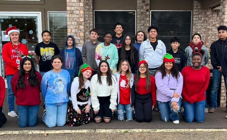 Memphis M5 students carol at Memphis Convalescent Center
