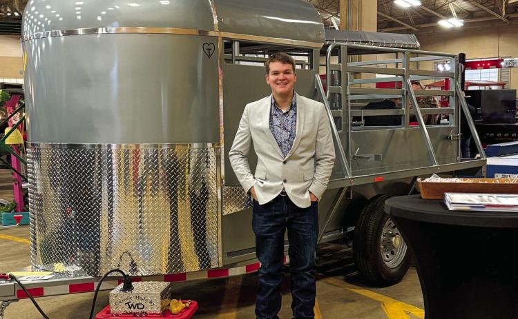 Childress High School Future Farmers of America (FFA) member Tuck Detwiler places second at the Fort Worth Stock Show and Rodeo Junior Agricultural Mechanics Project Show Friday, Jan. 17-Sunday, Jan. 19 in Fort Worth. Detwiler also received a blue ribbon on his half-top bumper-pull stock trailer, an award given to projects that earn at least 90 out of 100 possible points when being judged. Photos Courtesy of Childress FFA