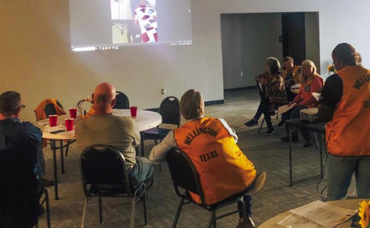 Lion Angie McDanel, right, informs members of the Wellington Lions Club about Neuromyelitis Optica (NMO) during its March 16 meeting. With March being NMO Awareness Month, McDanel shared details of her daughter’s ongoing journey. For her treatment, Jayla Kilgore receives an infusion every six months. The Red River Sun/Bev Odom