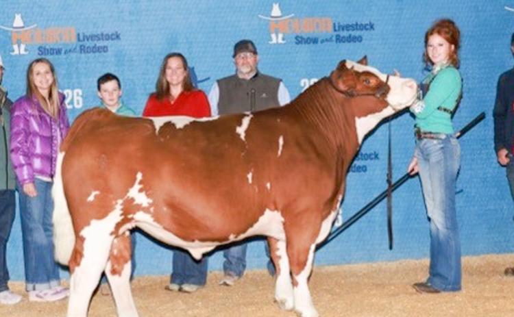 Bailey Page, a Wellington High School junior, travels to the Houston Livestock Show and Rodeo (HLSR) for spring break, placing second with her middleweight Simmental steer on Thursday, March 19 and earning a coveted sale spot at the HLSR sale scheduled for later this week. Wellington High School