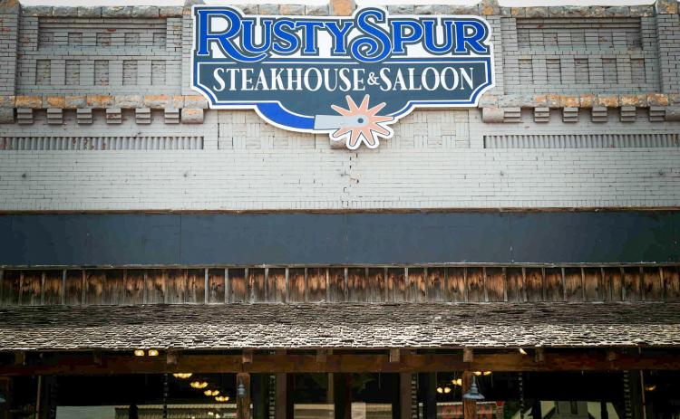 Rusty Spur Steakhouse and Saloon opens its doors to the public Tuesday, June 17, offering hand-cut certified Angus beef, a full bar, a pool table and the most anticipated amenity, a salad bar, complete with fresh vegetables daily. Through the Lens of Liz