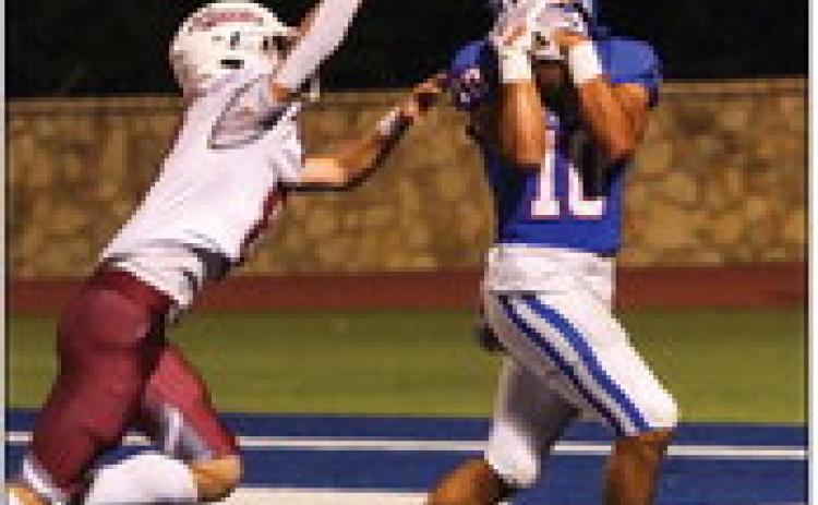 Childress’ Isaiah Jalomo (10) catches a 24-yard pass from quarterback Drake Rabe in the Bobcat endzone during the third quarter Friday, Sept. 22 at Fair Park Stadium. Photos by Childress High School Yearbook Staff