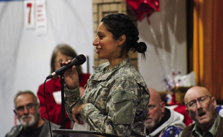 Childress Elementary School educator and veteran Esmeralda Valadez speaks at the annual Childress Elementary Veterans Day Program Friday, Nov. 11. For additional photos, see 10B. The Red River Sun/Elizabeth Tanner