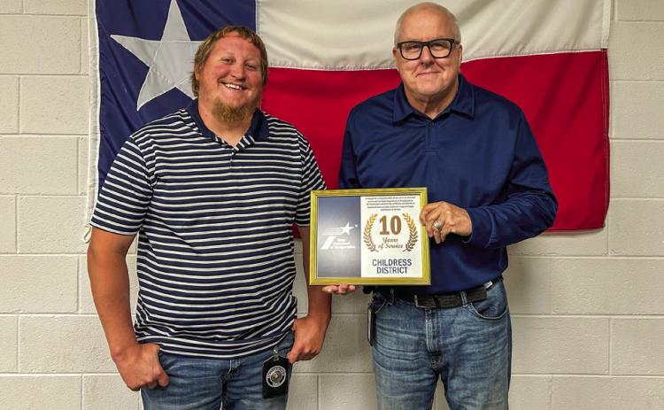 Texas Department of Transportation Childress District Engineer Darwin Lankford awards General Engineering Technician Chance Cozart for 10 years of service. Photos Courtesy of TxDOT Childress District