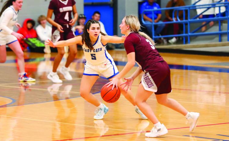 The Childress Lady Cats open the season with an overtime 43-42 win against the Clarendon Lady Broncos Saturday, Nov. 12. Photo by Elizabeth Gamboa