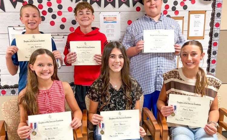 Sparklers garner citizenship, ‘Top 10’ awards Daughters of the American Revolution present Wellington Junior High School Youth Citizenship Awards to open the Wellington Junior High School 2026 Awards Assembly at 10 a.m. Monday, May 11. From left: sixth grade, Berkeley Ward, Jake Anderson; seventh grade, Quinn Roberson, Jeffery Fires; eighth grade, Claire Kane, Caleb Colson. BEV ODOM/THE GREENBELT INTREPID