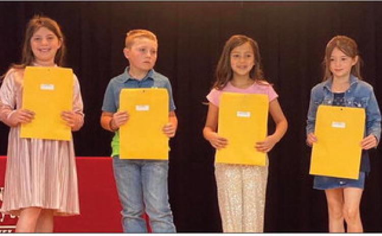 Courtesy Photos Debbie George’s second graders accepting A Honor Roll, Perfect Attendance and American Citizenship awards are as follows. From left: Callahan Cantu, A Honor Roll, American Citizenship; Joe Lemons, A Honor Roll, Perfect Attendance; Sophia Manuel, A Honor Roll; Peyton Roberson, A Honor Roll, American Citizenship.