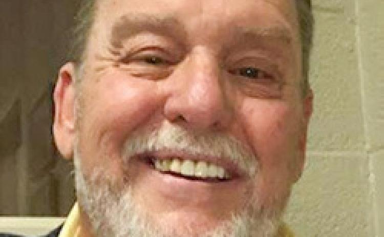 JOHN R. BALLEW