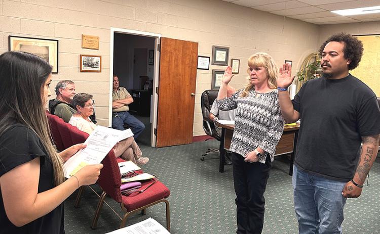 Memphis City Secretary Amalia Gaxiola administers the oath of office to newly elected council members Melisa Hibbitts and Micah Casas during the Monday, May 11 meeting at Memphis City Hall. CITY OF