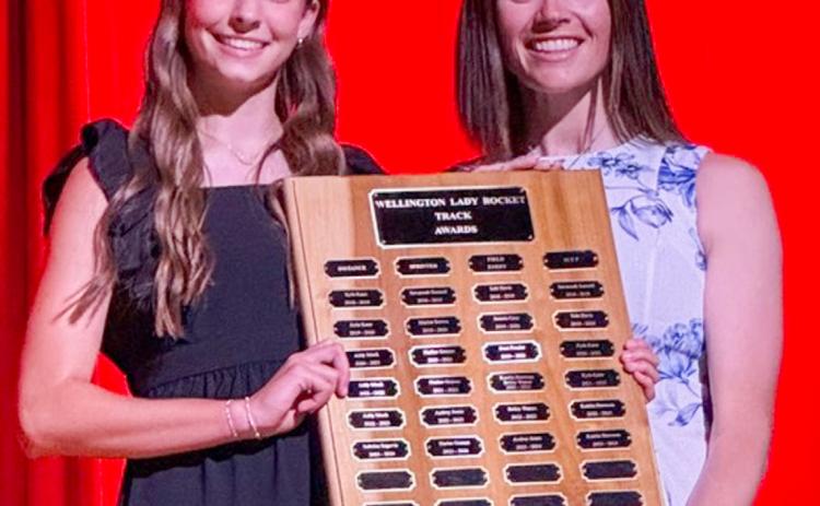 During the 6:30 p.m. Monday, May 11 Wellington High School (WHS) All-Sports Banquet at the WHS Auditorium, students received recognition for an outstanding year of Skyrocket athletics. Wellington High School freshman Libby Chandler receives the Girls’ Track Sprinter Award, presented by Coach Courtney Head. SHAUNA SALINAS/THE GREENBELT INTREPID