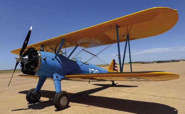 A Stearman, built in 1941 and restored in 2018, fuels up at the Childress Municipal Airport Tuesday, June 25 during a flight spanning from California to Michigan. Photo by Tiffany Tully