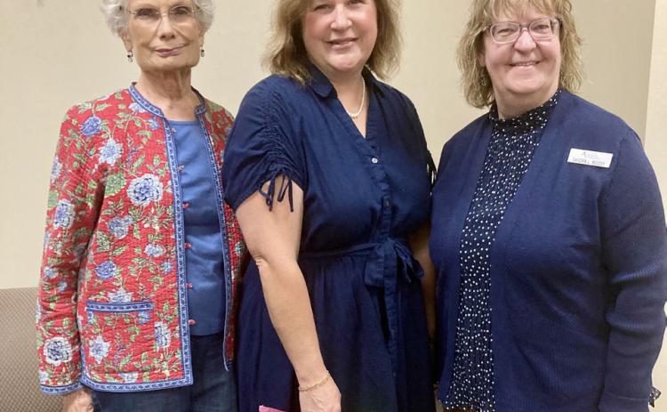 Modern Home Club hostesses Mary Ann Hickman, left, and Sandra Moody, right, welcome Childress County Judge Kimberly Jones, who served as guest speaker at the club’s Thursday, Oct. 16 meeting at the Childress Municipal Development District. Modern Home Club