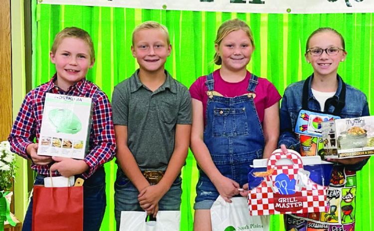 From left: Kolt Whitaker, second place; Gunner Pierce; Emma Moore; Miranda Henry, first place.