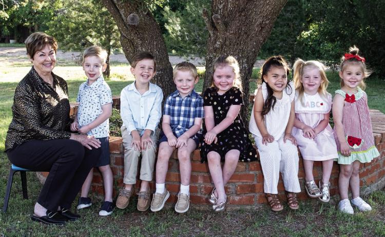 Three-year-old 2025 Tiny Texan Preschool graduates. From left: Director Carol Freeman, Colter Wellborn, Michael Morris, Luke Lemons, Charla Hagar, Kennedi Maldonado, Ellery Allred and Hartlee Stratton. Statham Photography