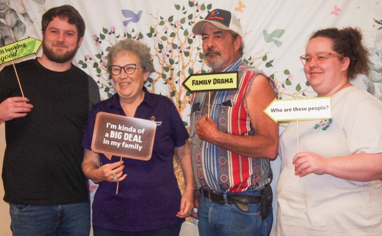 Among families at the annual Holman Reunion was that of David Holman, third from left. David, a graduate of Childress High School, is the son of Duwaine “Wayne” Holman and the grandson of Woodrow Holman. From left is David’s family: Slade Holman, son, of Rose Bud, Ark.; David’s wife, Sandra; David; and his daughter. Baile Prince, of Conway, Ark. GRACE HOLMAN