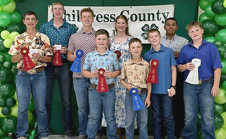 Childress County 4-H members who completed Record Books include, from left, Quay Bruce, Sterling Bruce, Ryker Schaefer, Kage Whitaker, Liesel Schaefer, Dawson Adcock, Rhett Schaefer, Bryson Session, and Kolt Whitaker. COURTESY PHOTO