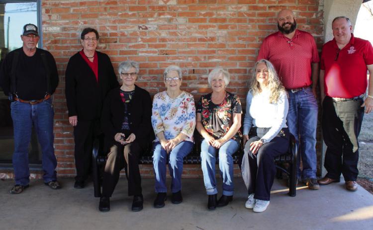 Memphis Housing Authority Board Members, as well as family and friends of the late Orvilla Evans, join for a memorial bench dedication service, honoring Evans, who served a 20-year tenure on the Memphis Housing Board of Commissioners, Thursday, Feb. 27 at the Memphis Housing Authority. The Red River Sun/Elizabeth Tanner