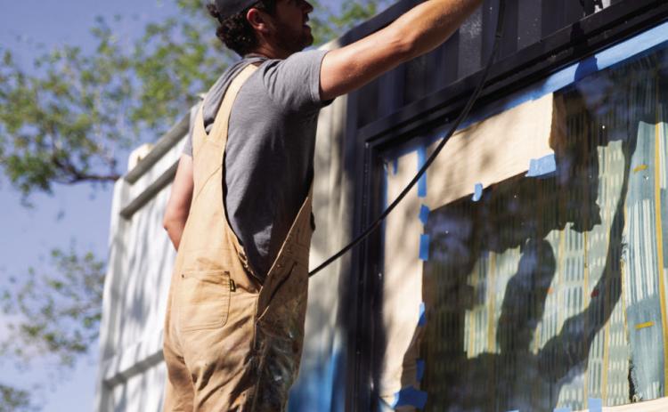 Nationally recognized muralist Matt Tumlinson paints Container 5 at Hotel Turkey. Photos Courtesy of Hotel Turkey