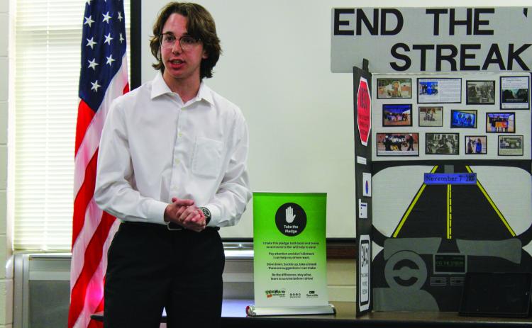 Darren Pratt, along with teammates Kara Palomo and Meg Ridens, presents “End the Streak ’23,” their Public Policy Advocate Level 3 project which they will take to the 2023 State Leadership Conference this weekend. For additional photos, see 2A. The Red River Sun/Elizabeth Tanner
